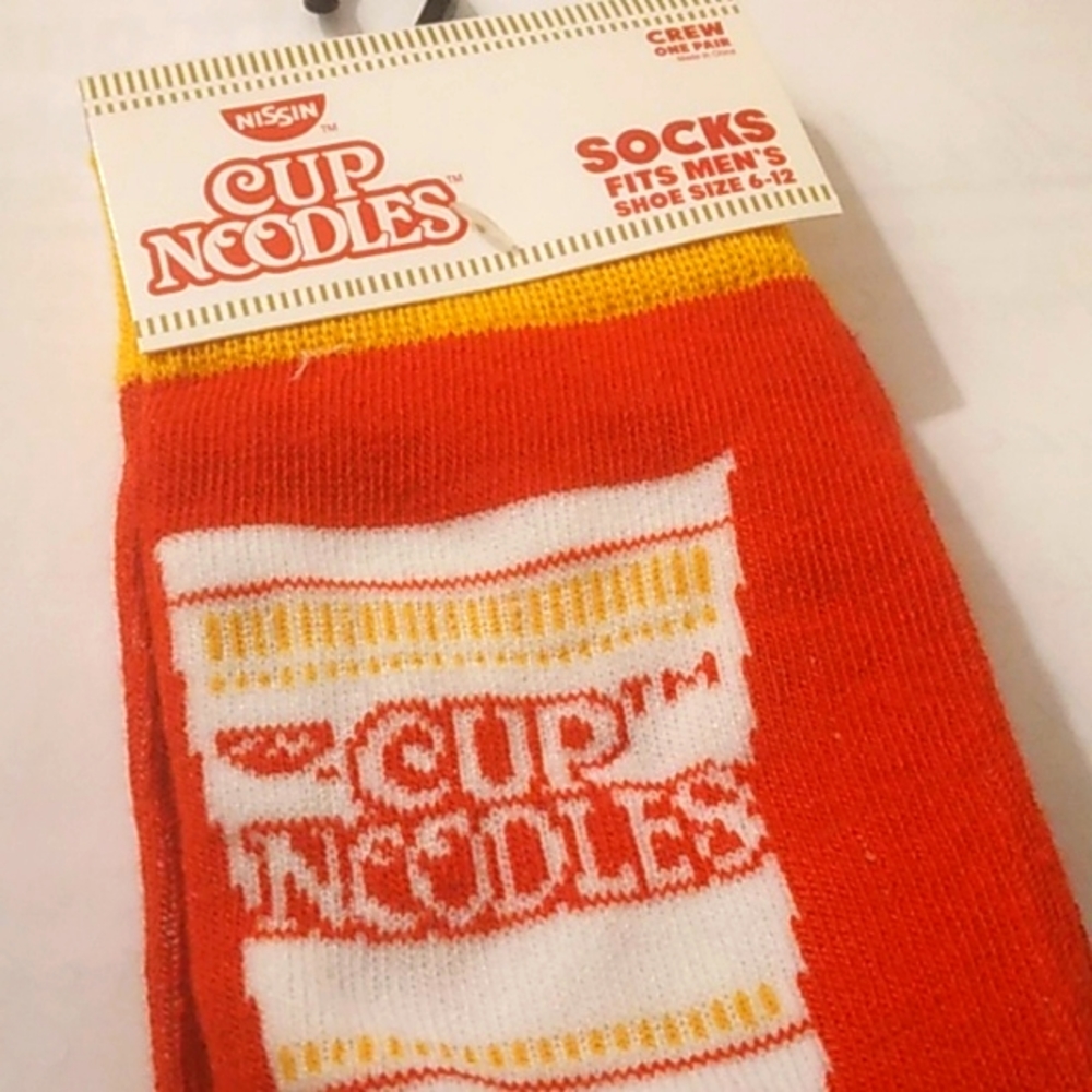 Fun socks cup of noodles.